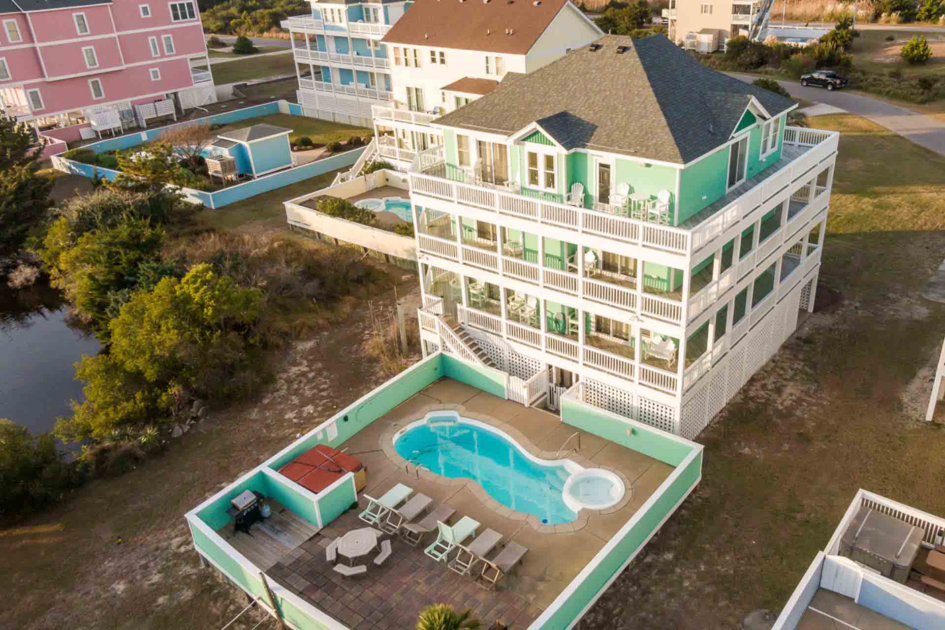 Surf Or Sound Realty 503 Whale Kept Secret Drone Exterior Pool View Resized 3360806