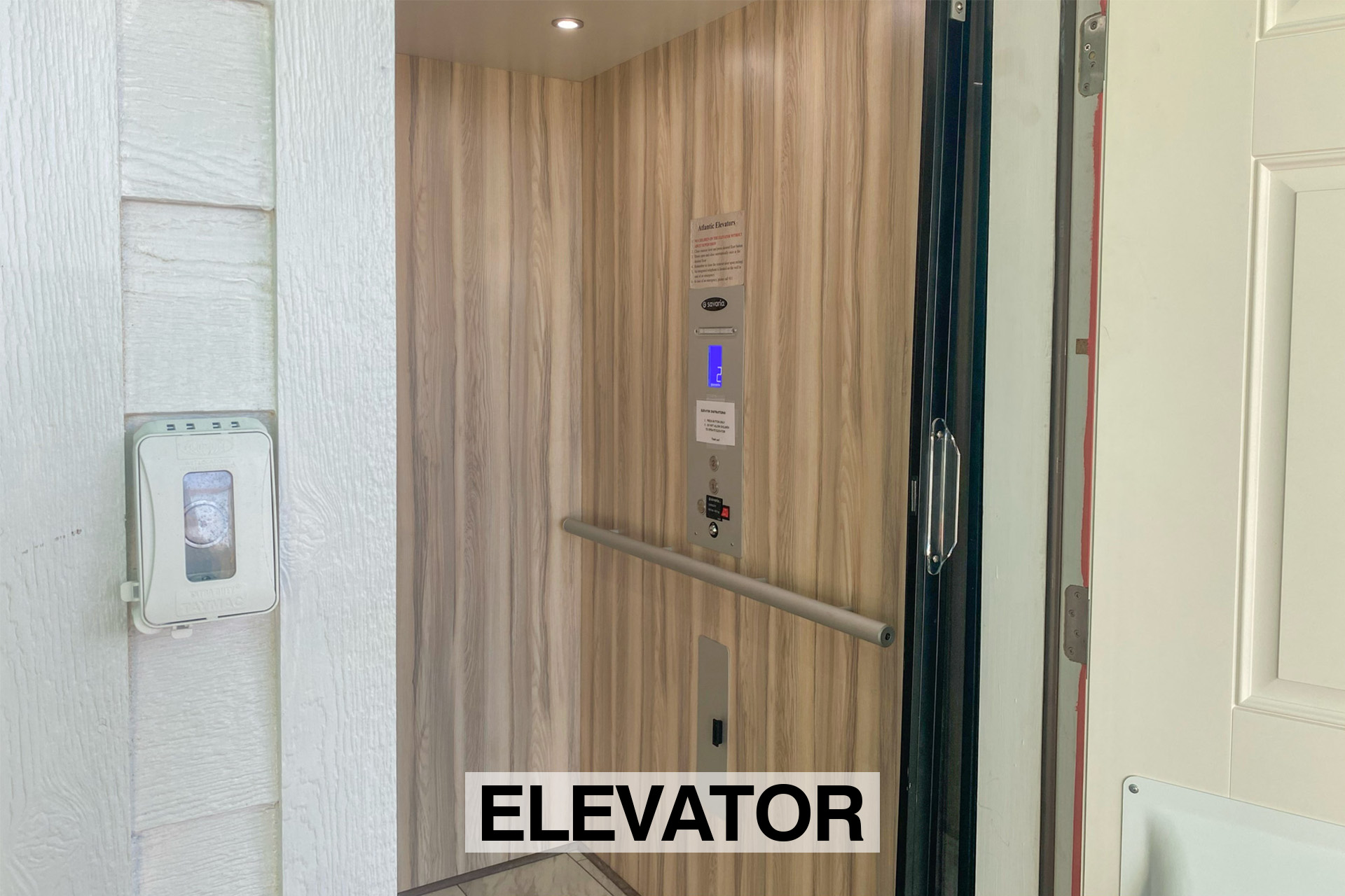 Surf Or Sound Realty 1160 Endeavor Elevator Label