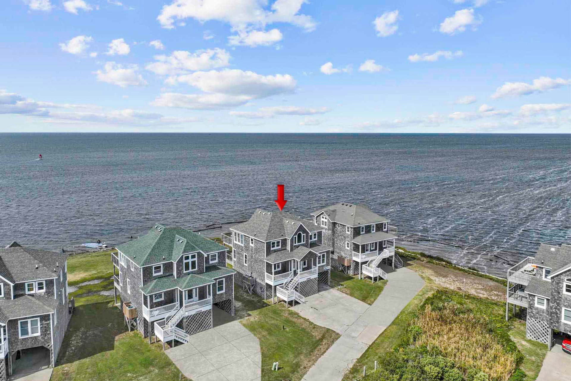 Surf Or Sound Realty 1073 Island Storm Exterior Arrow 4 3368003